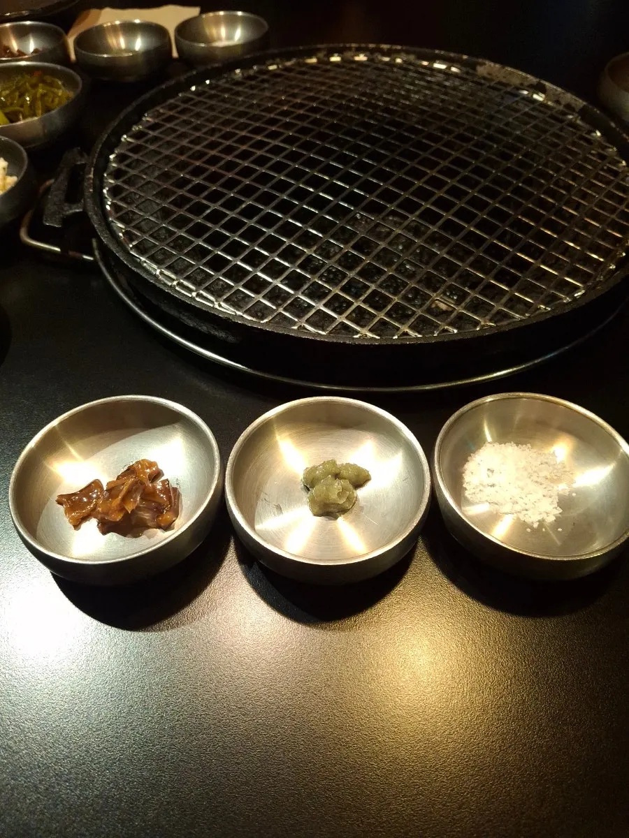 Table setting with pickles and gat kimchi as basic side dishes