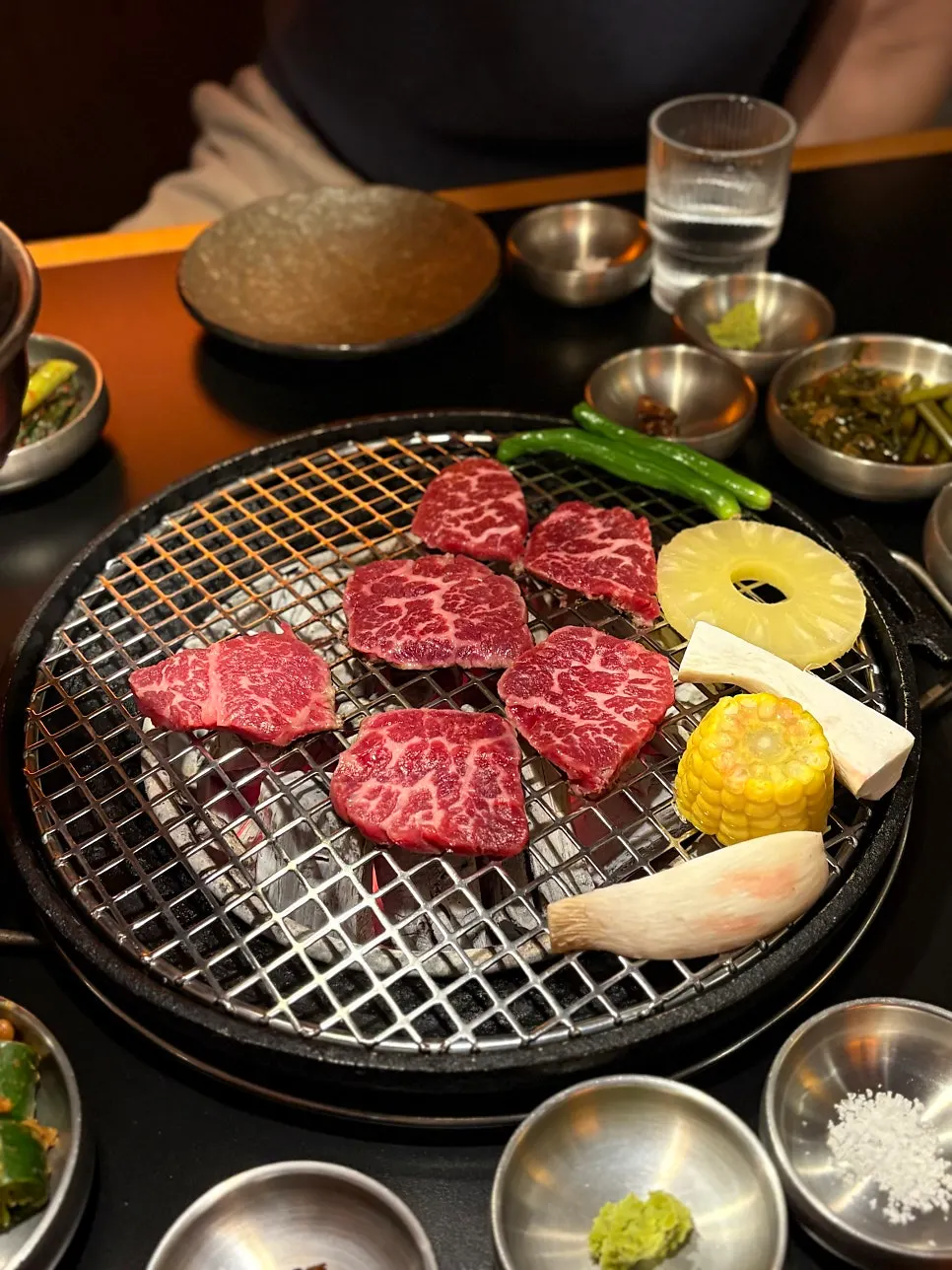 Chamjinsal and angeomisal grilling over the charcoal