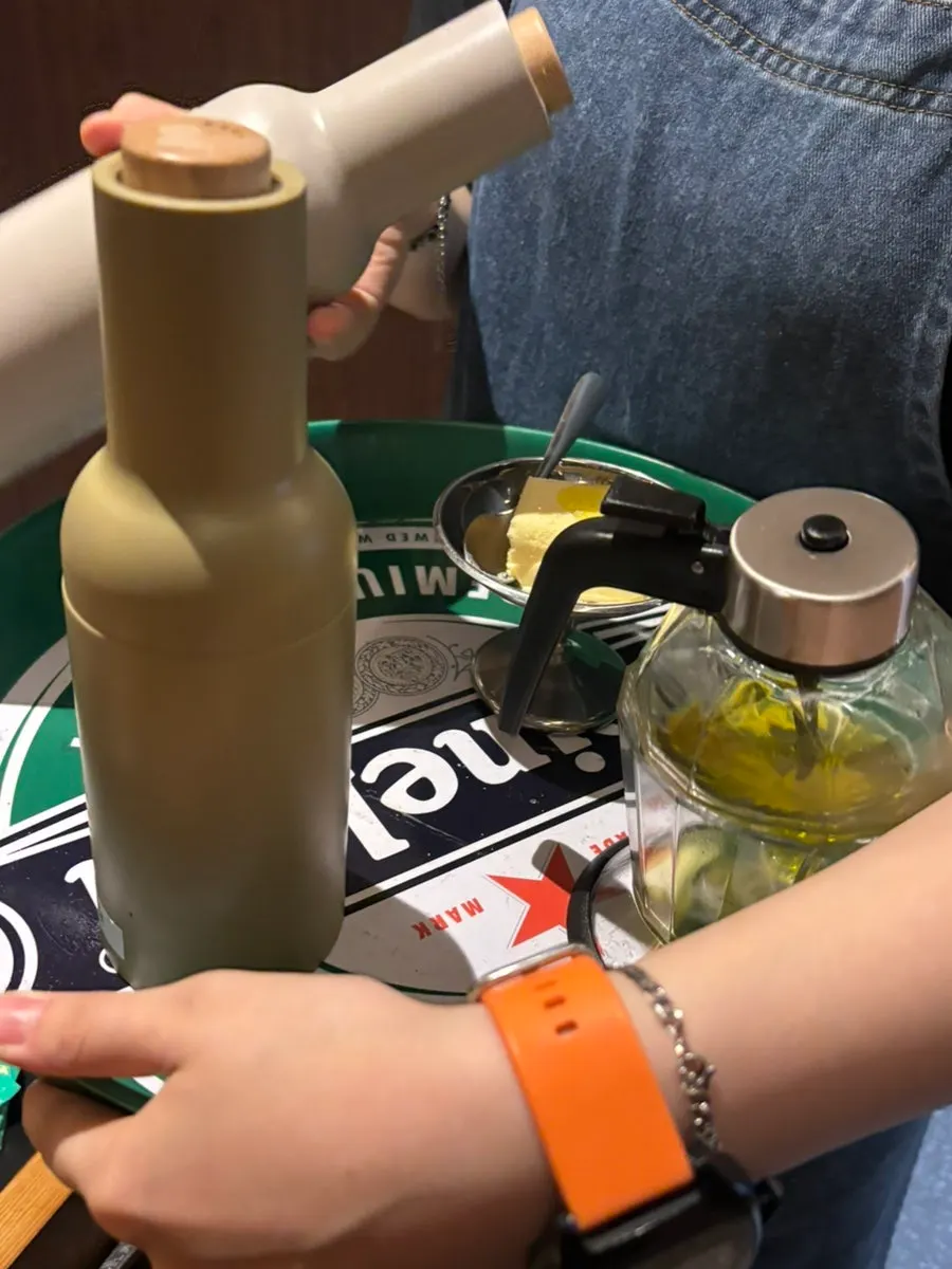 Ice cream served with salt, pepper, and olive oil