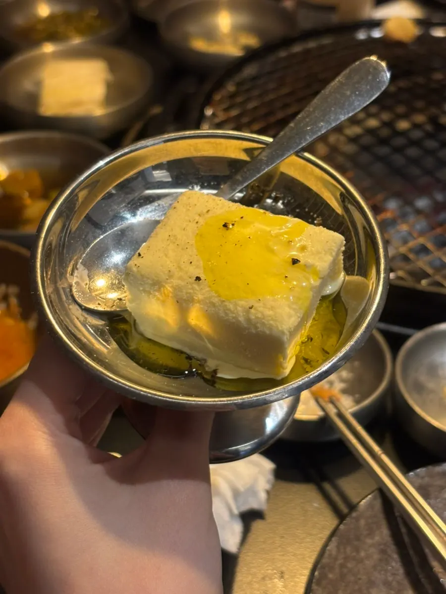Ice cream topped with olive oil and salt