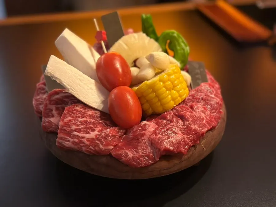 Grill plate set on the charcoal burner