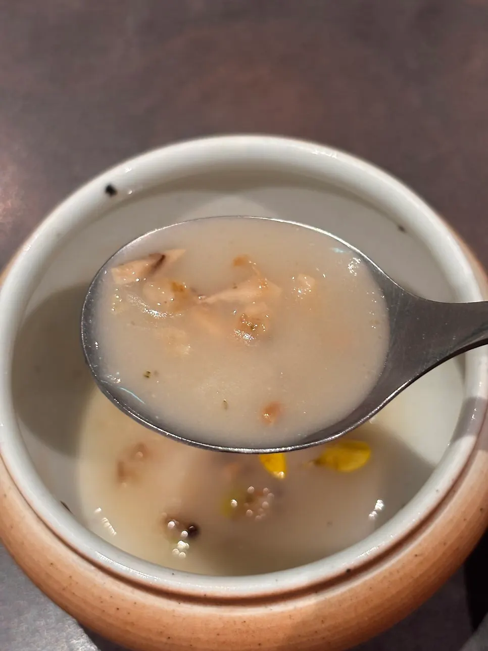 Ugyejinjuk topped with nurungji and shiitake mushroom
