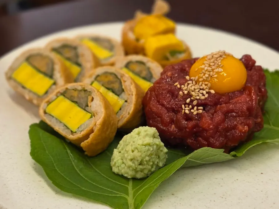 Plated gochujang yukhoe with yubu-mari at Usul