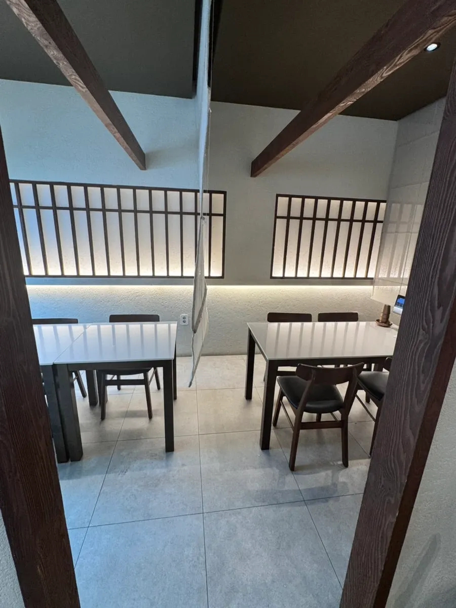 Soft indirect lighting in the main hall of Useum Pangyo Branch