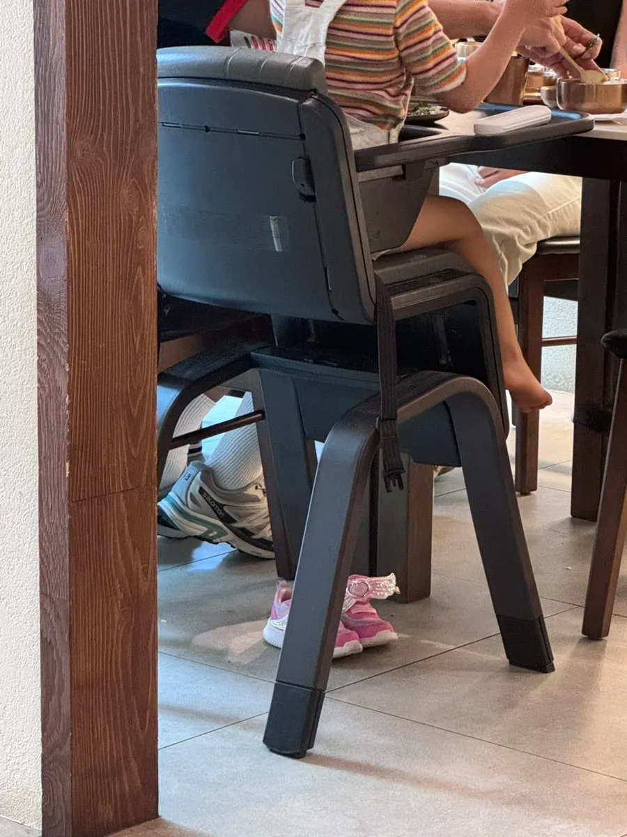 Self-serve aprons and baby chairs on hand