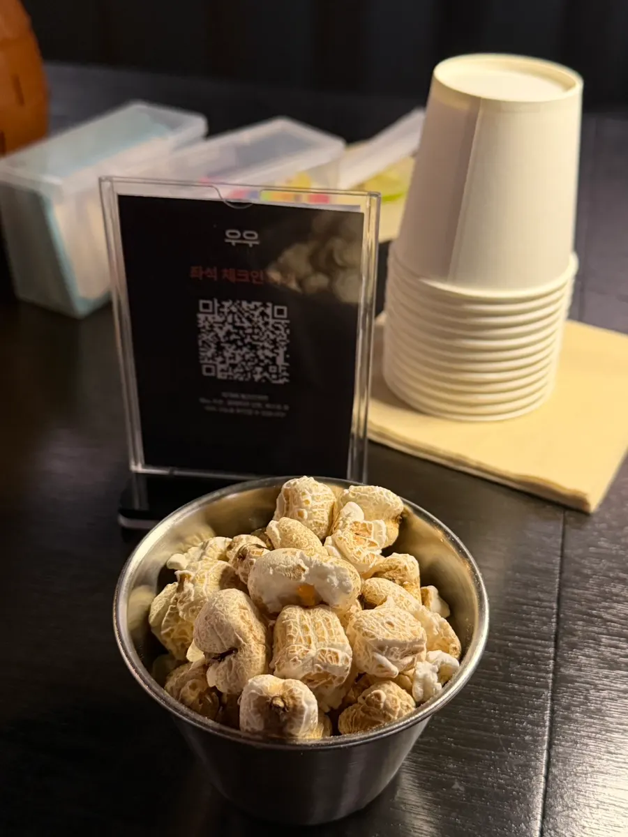 Uu's basic snack of corn puffs with a drink