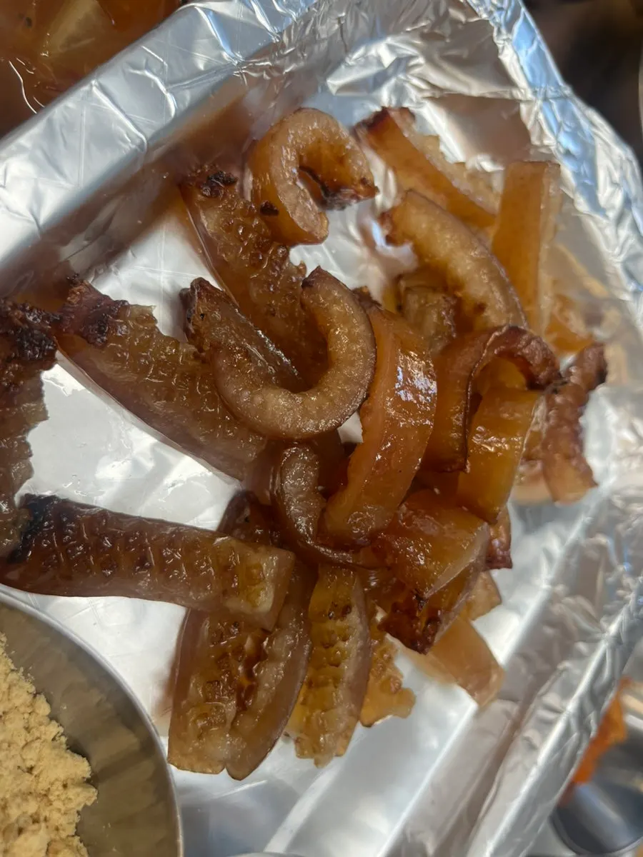 Pork skin served with soybean powder and spicy sauce