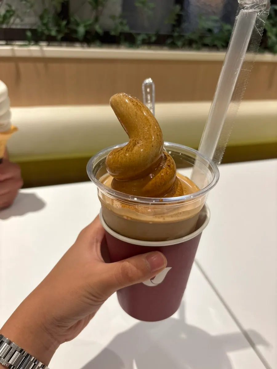 A latte topped with rich, sweet vanilla ice cream