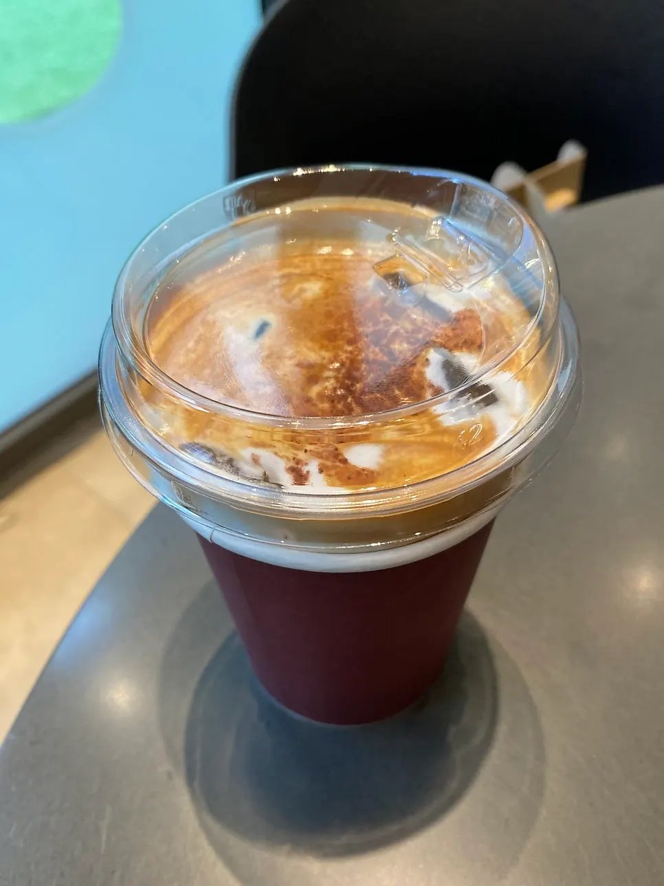 Iceumeu-style Wunder Coffee topped with milk foam