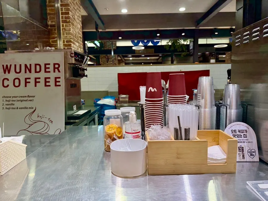 In front of the ordering counter at Wunder Coffee Bar