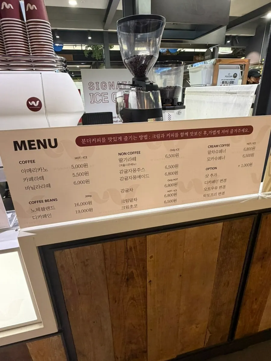 Wunder Coffee Bar order counter and menu signage