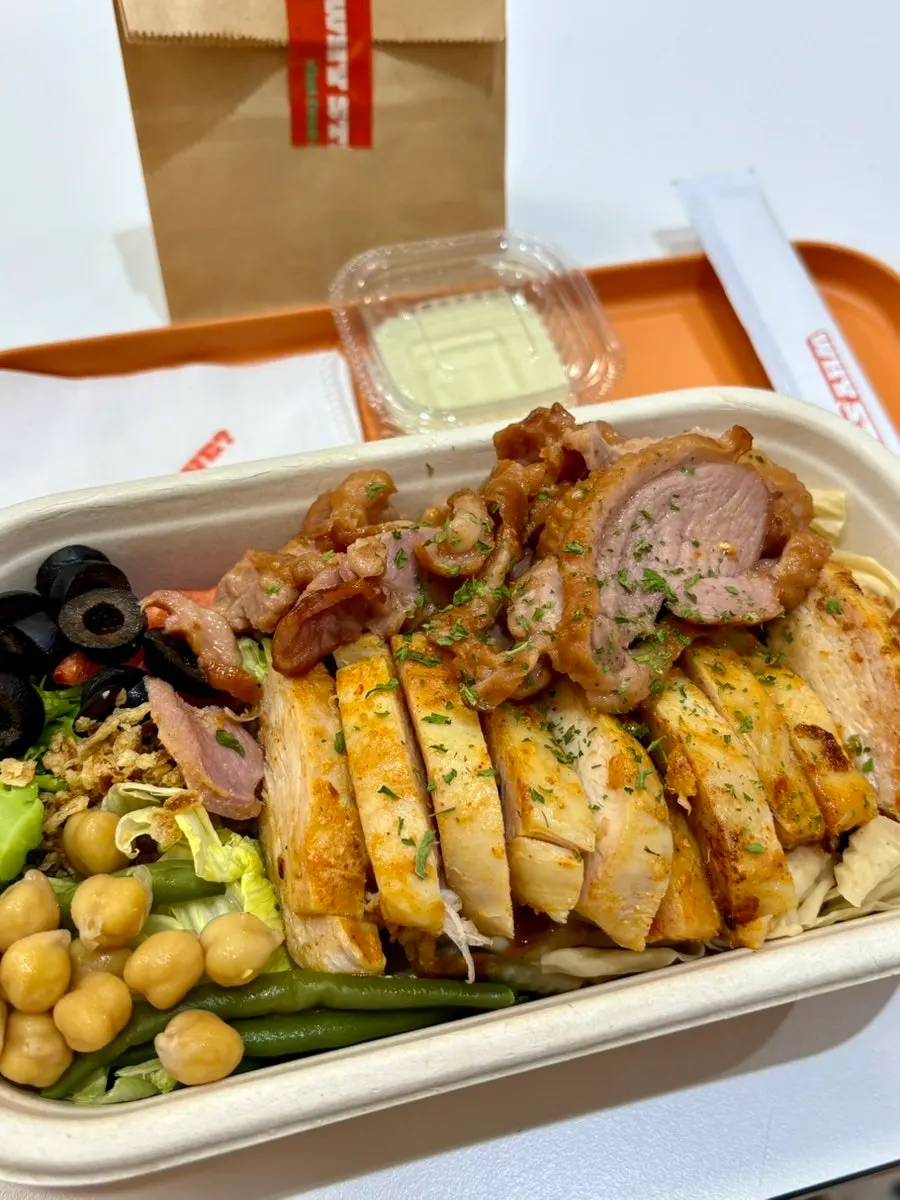 Protein box loaded generously with meat toppings
