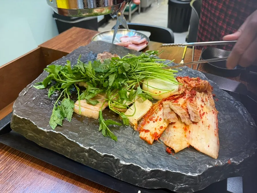 Meat and grilled kimchi turning golden brown