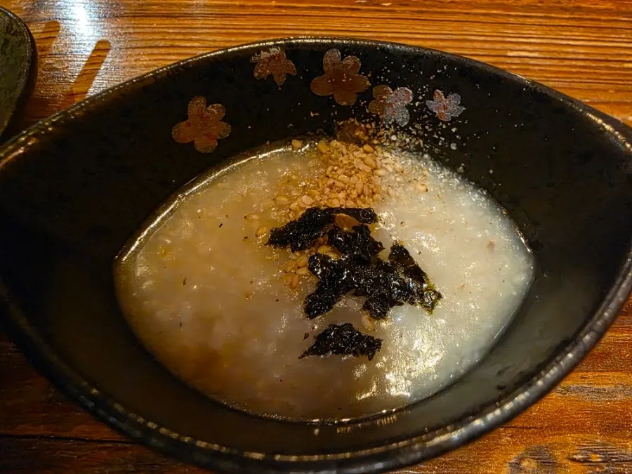 Beef vegetable porridge with a cloth hand towel