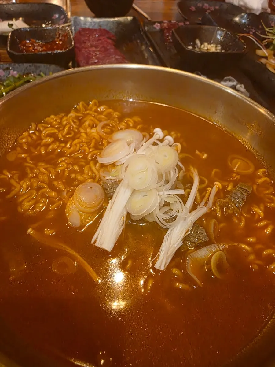 Beef ramyeon served in a large bowl