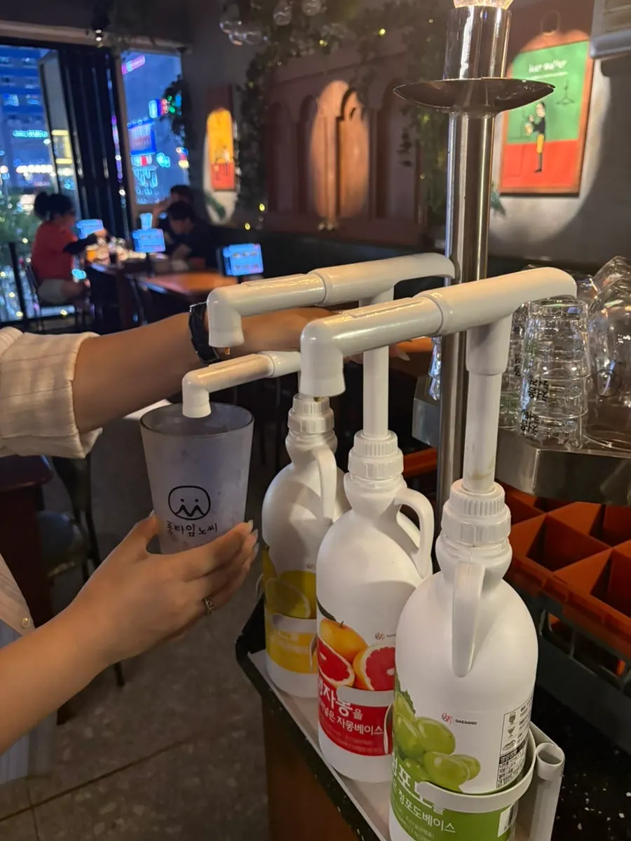 Self-serve bar with glasses and utensils