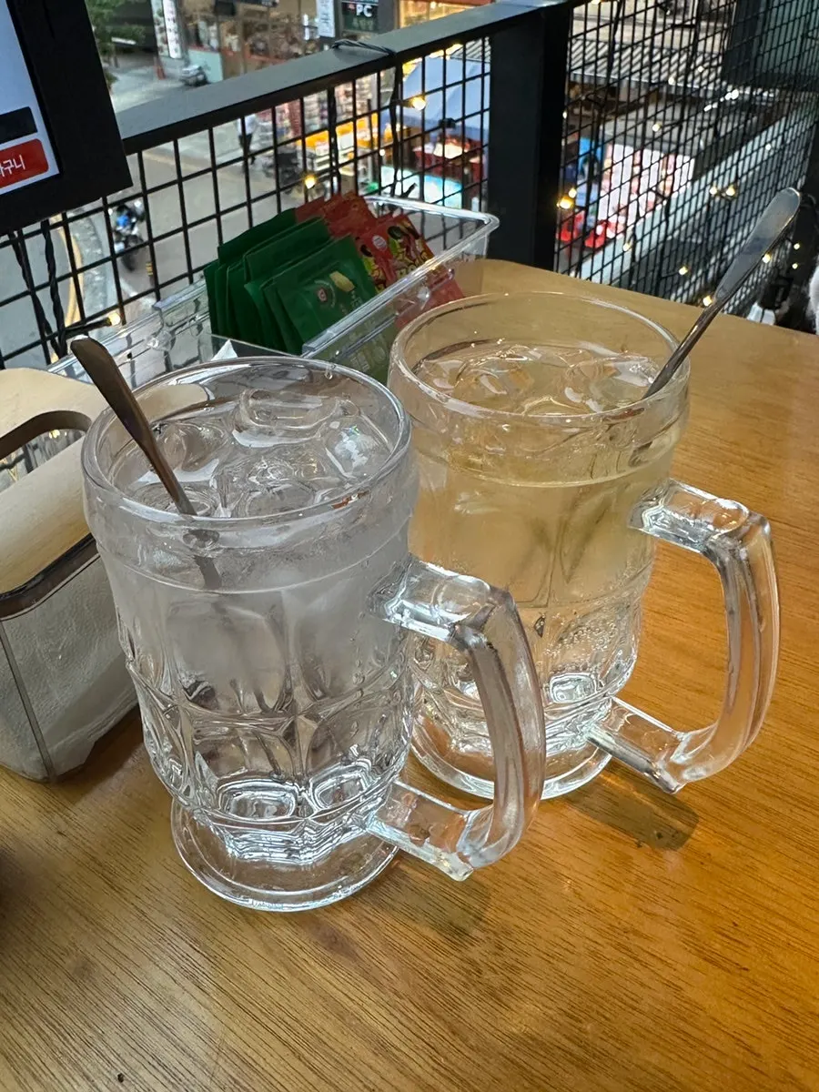 Two glasses of Suntory and Peach Tree highballs