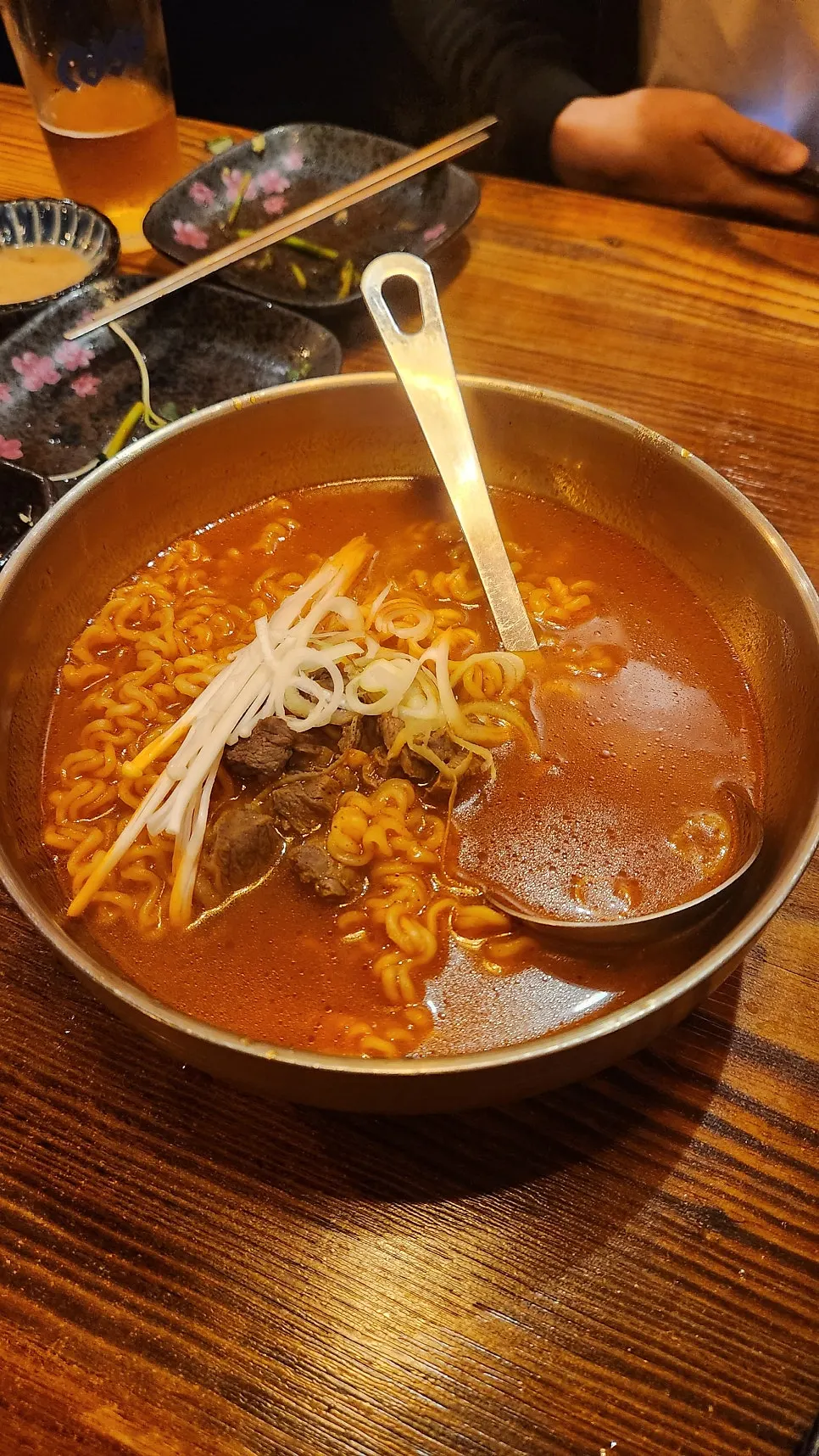 Korean beef tataki served over a bed of onions