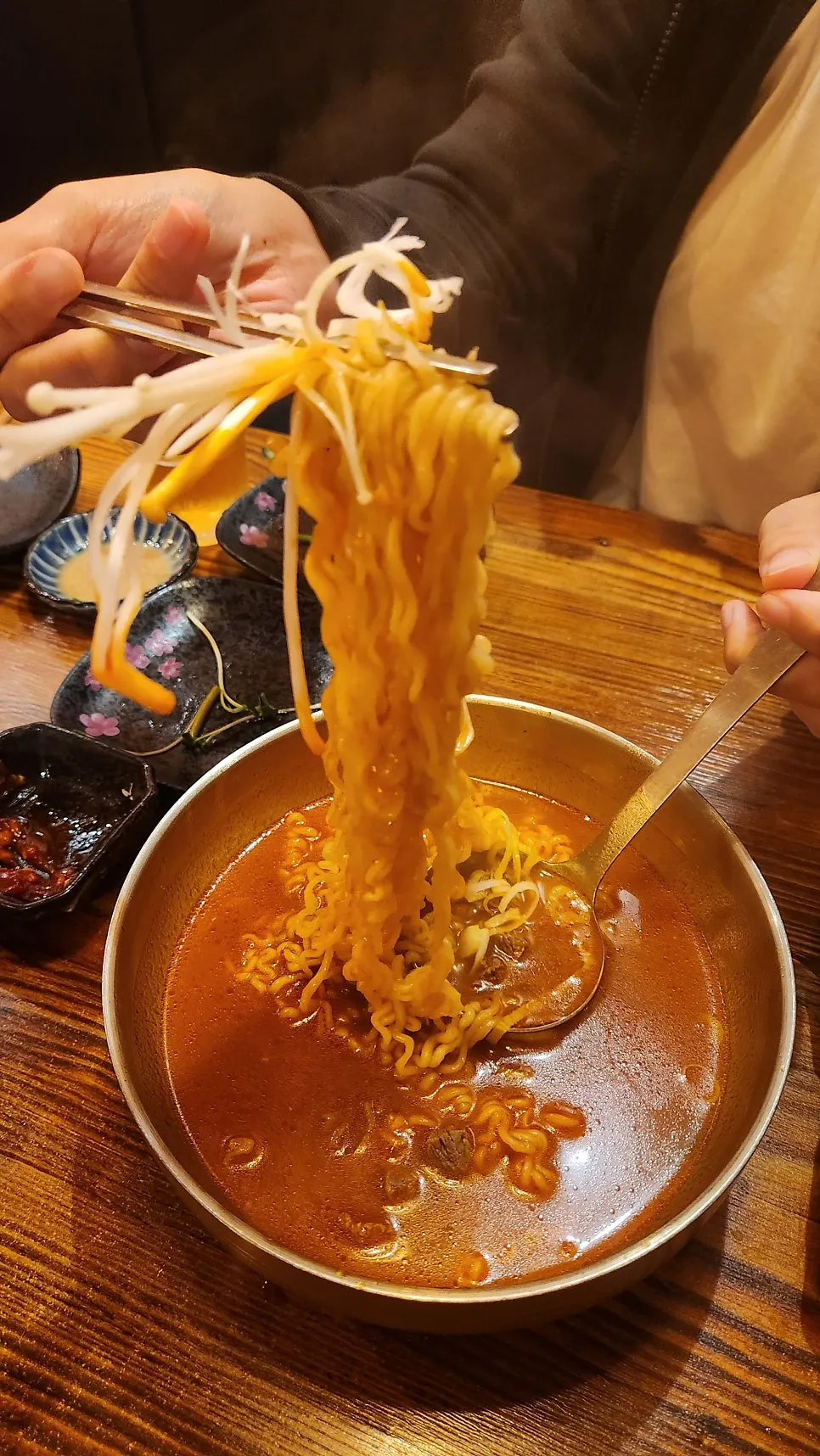Korean beef tataki dipped in peanut sauce