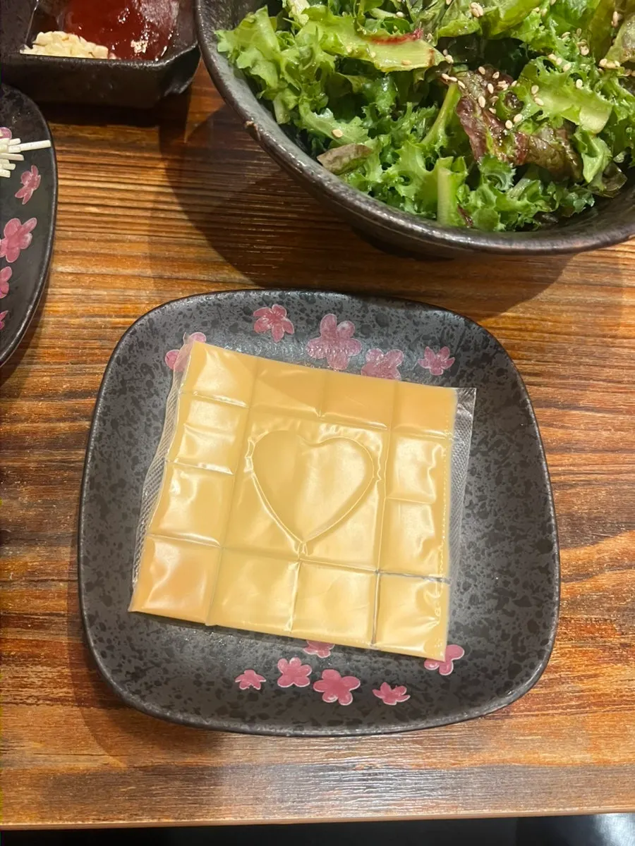 Cheese plating served alongside the meal