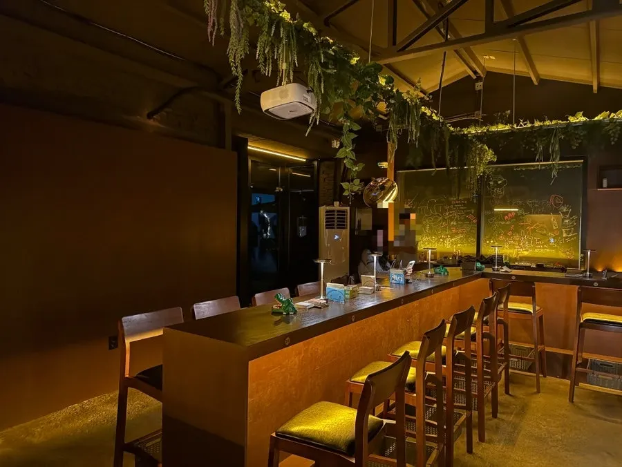 Interior of Yahwa Honsulbar bathed in soft lighting