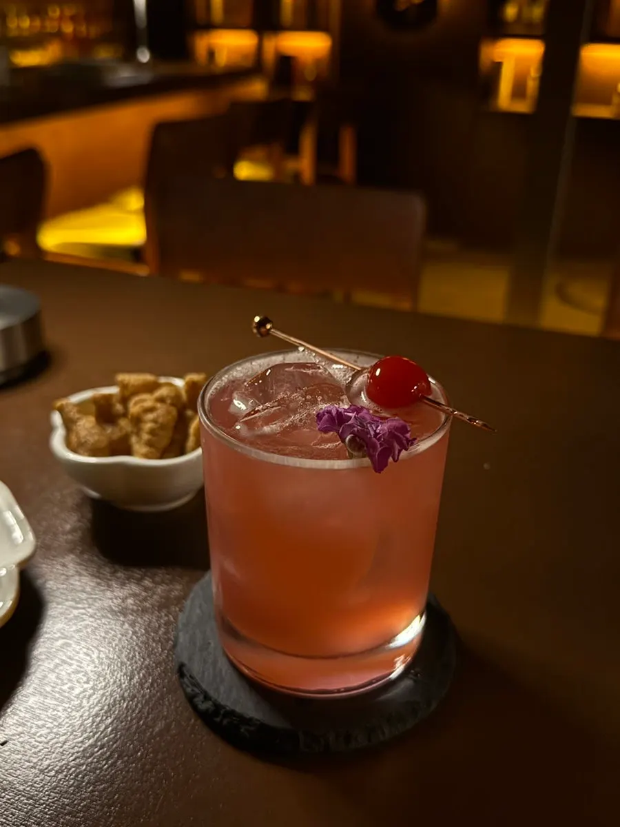 A glass placed alongside the non-alcoholic menu