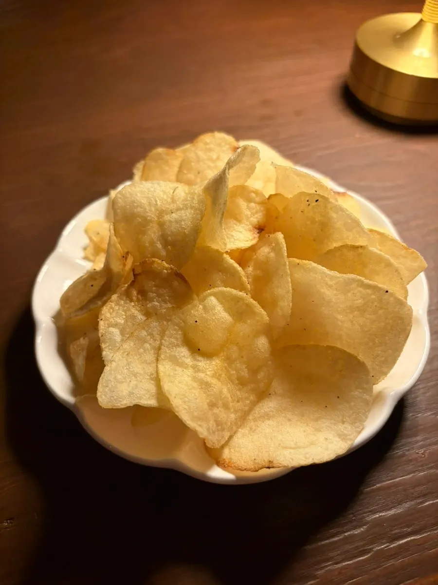 Truffle potato chips served as a snack