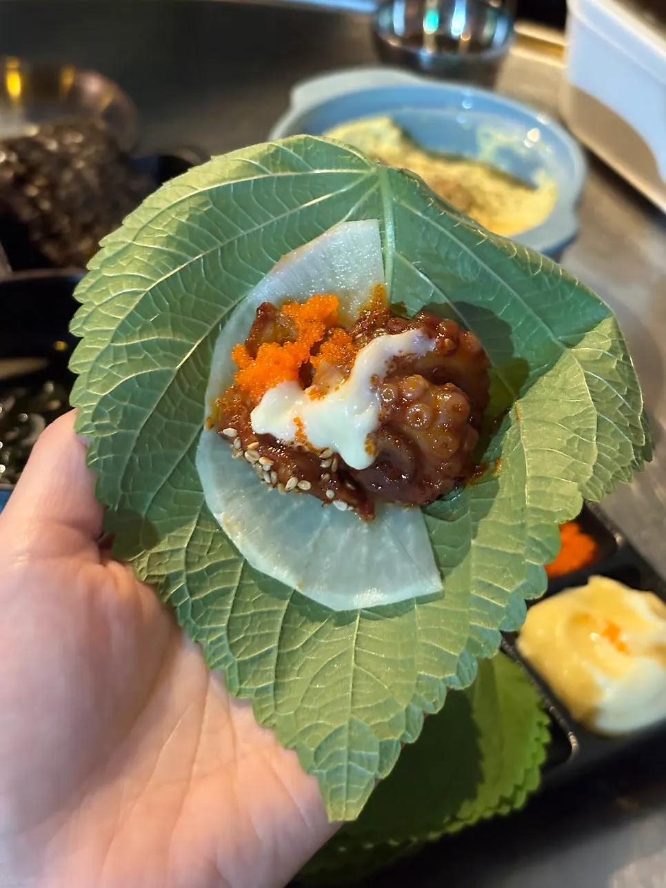양념이 배인 쭈꾸미 한 점