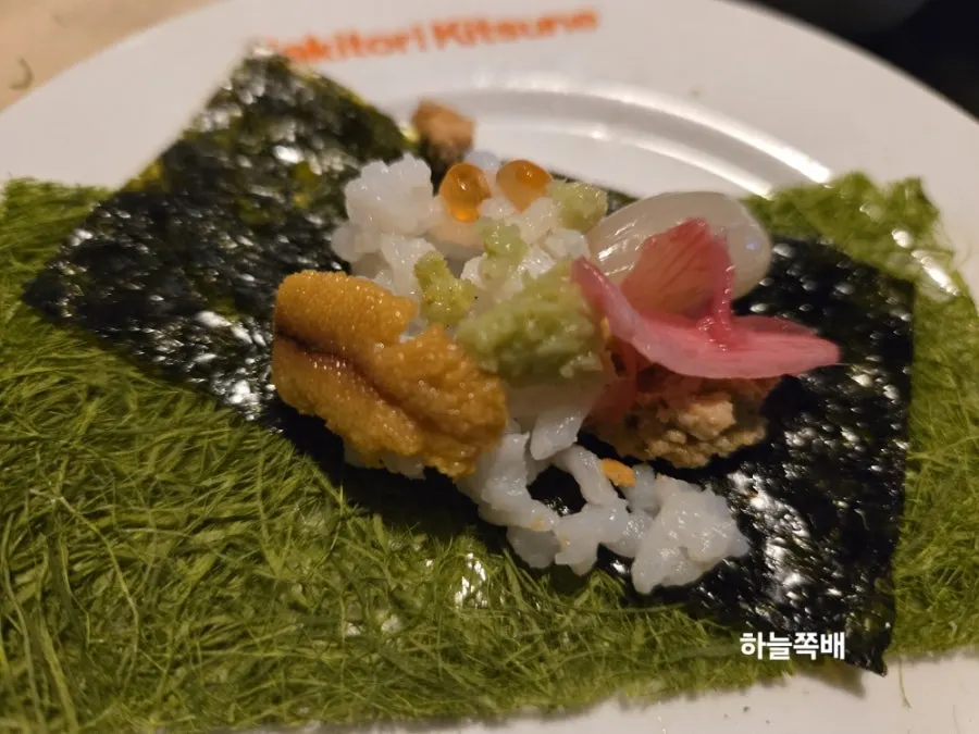 Ankimo on a cracker, canapé-style