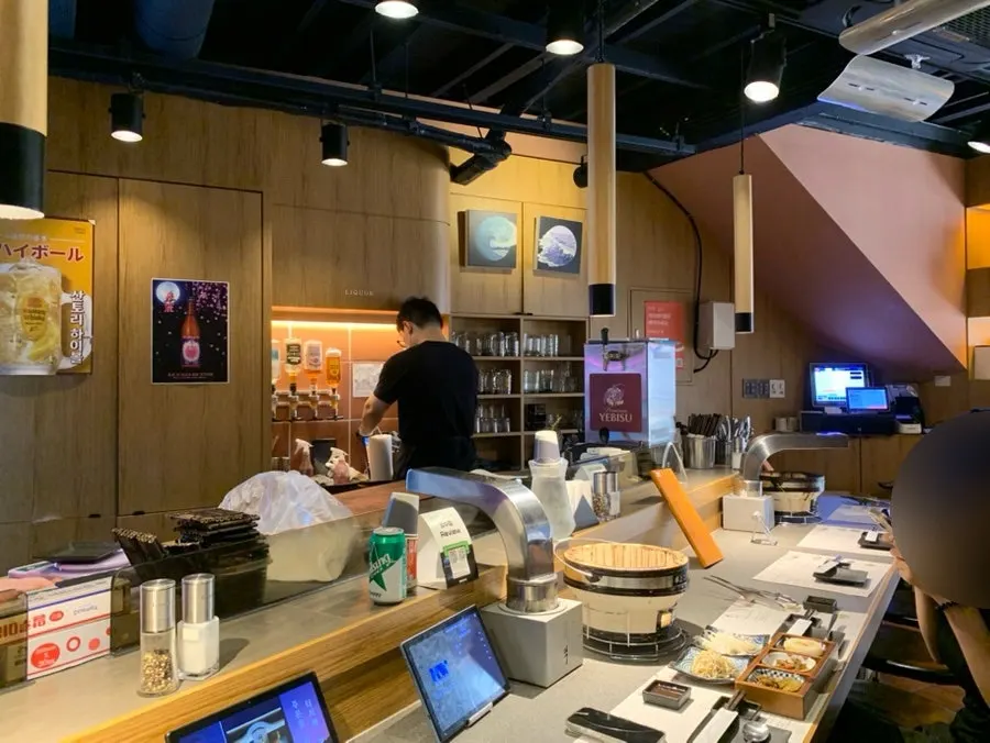 Interior of the restaurant filled with customers
