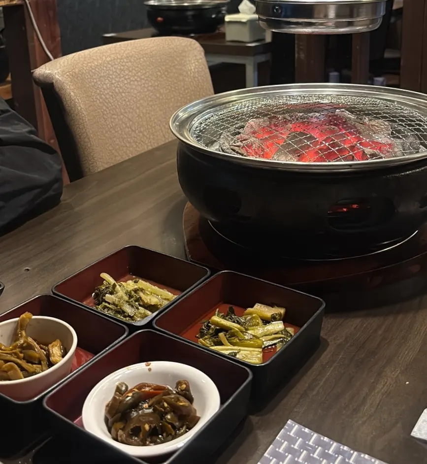 Gungchae, peppers, and pickled greens side dishes