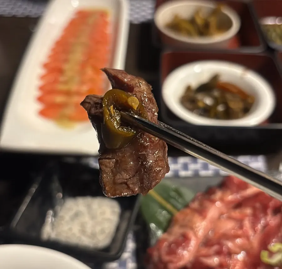 Skirt steak eaten with pickled peppers