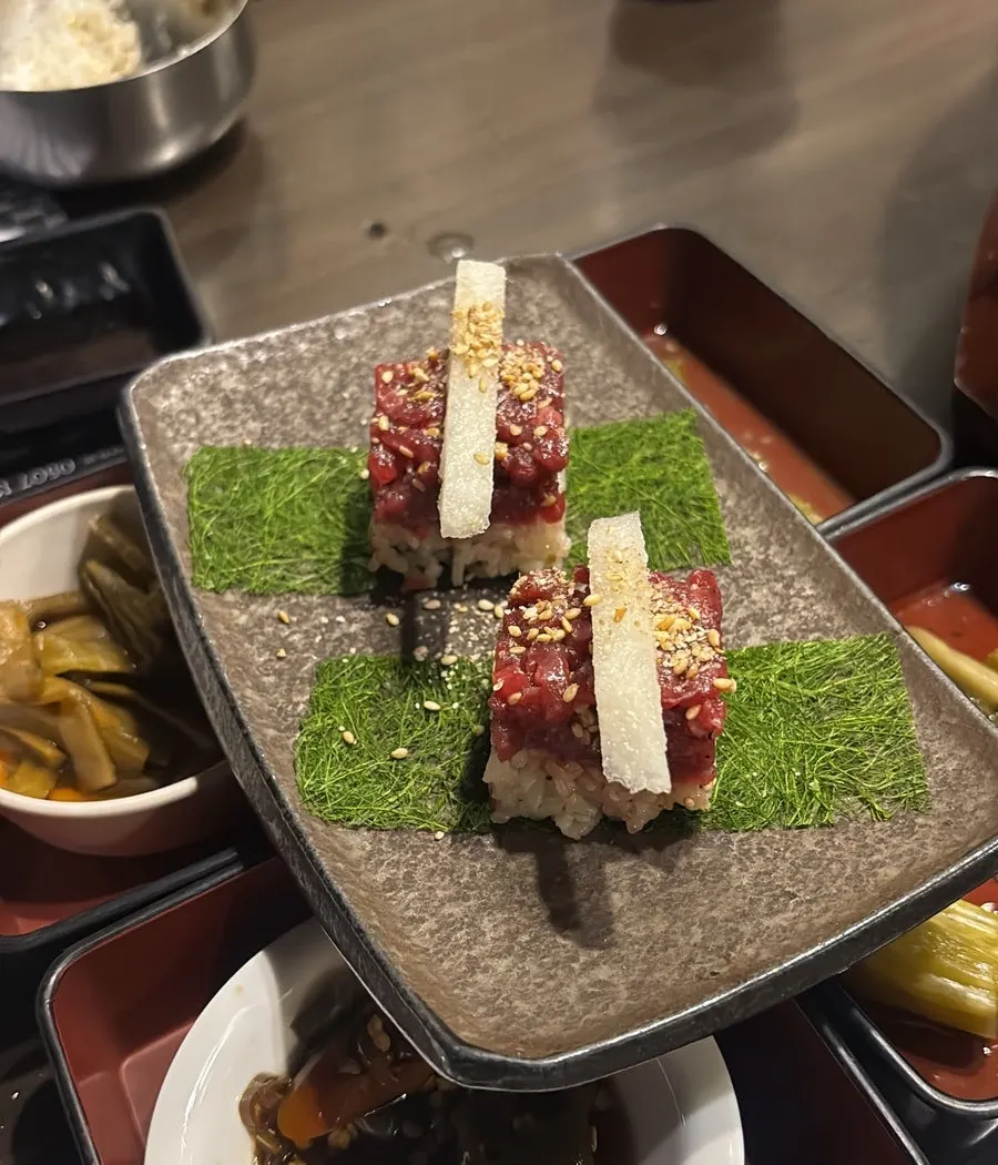Laver-wrapped raw beef sushi received through a review event