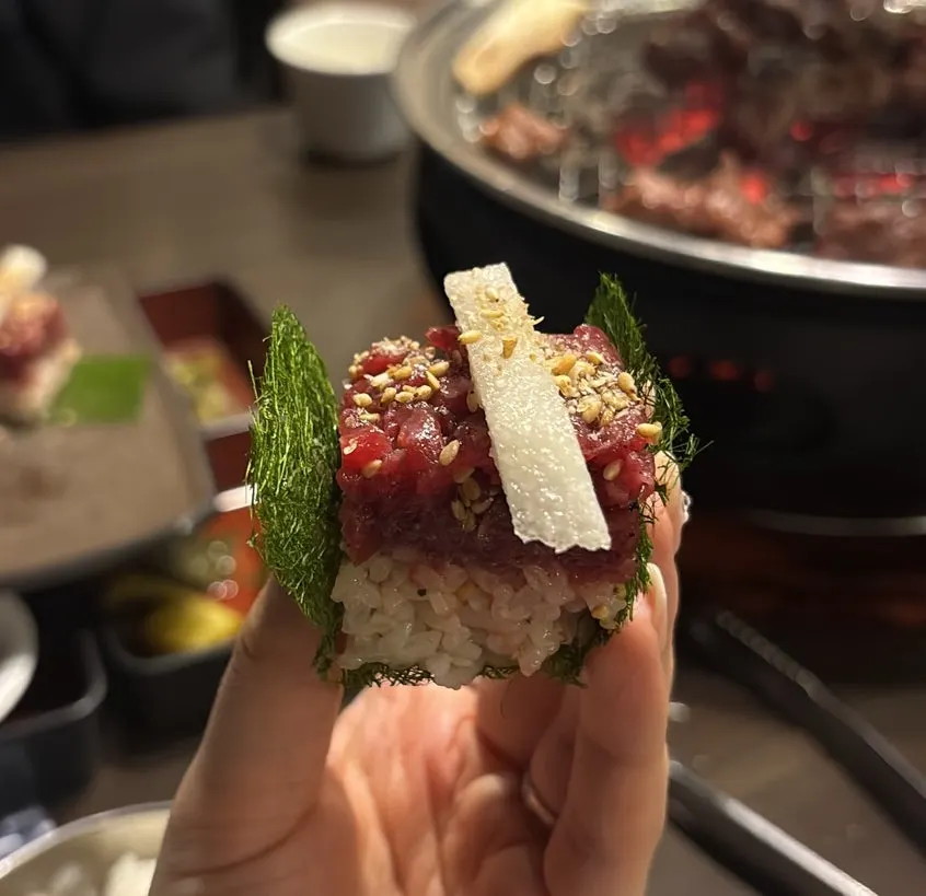 Laver-wrapped raw beef sushi piled high with raw beef