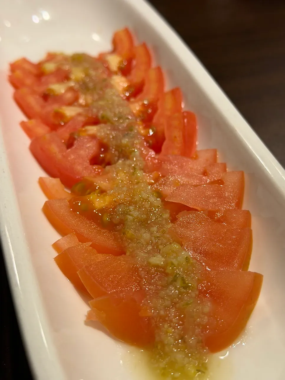 Tomato slices served on the house