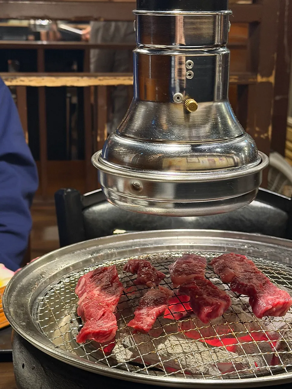 Premium short rib grilling over charcoal