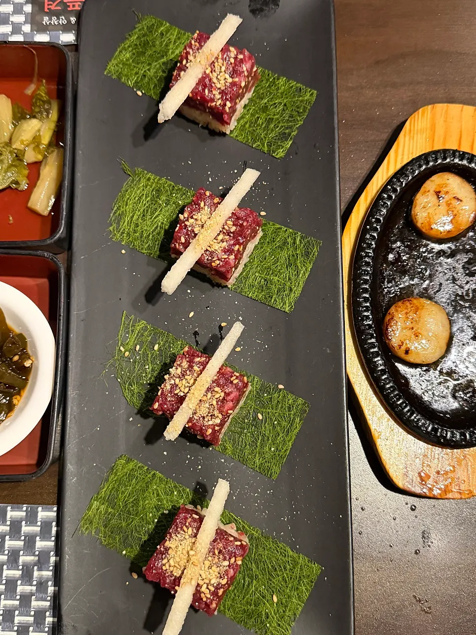 The abundantly filled dinner table at Yakiniku Pungyeong