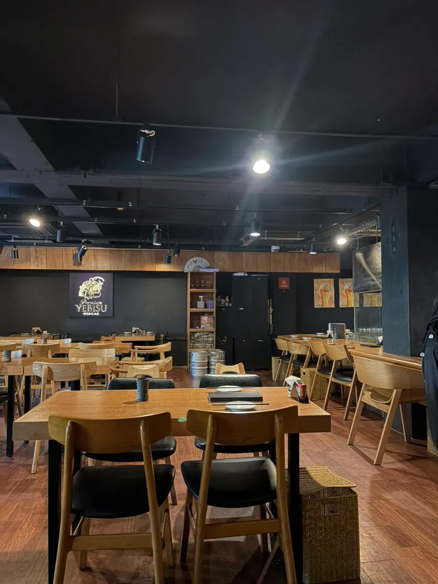 Wood-toned interior of Yakitori Shomong