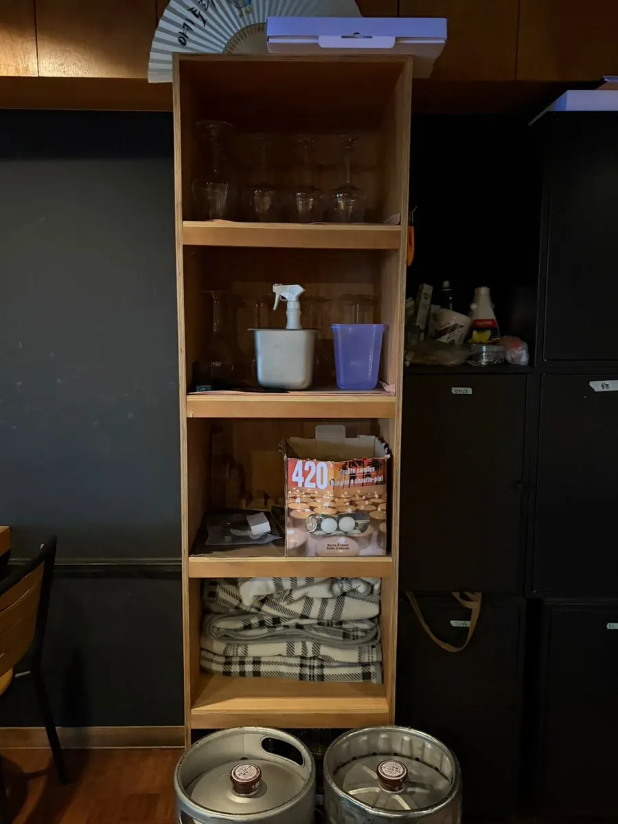 Storage bin next to the seating