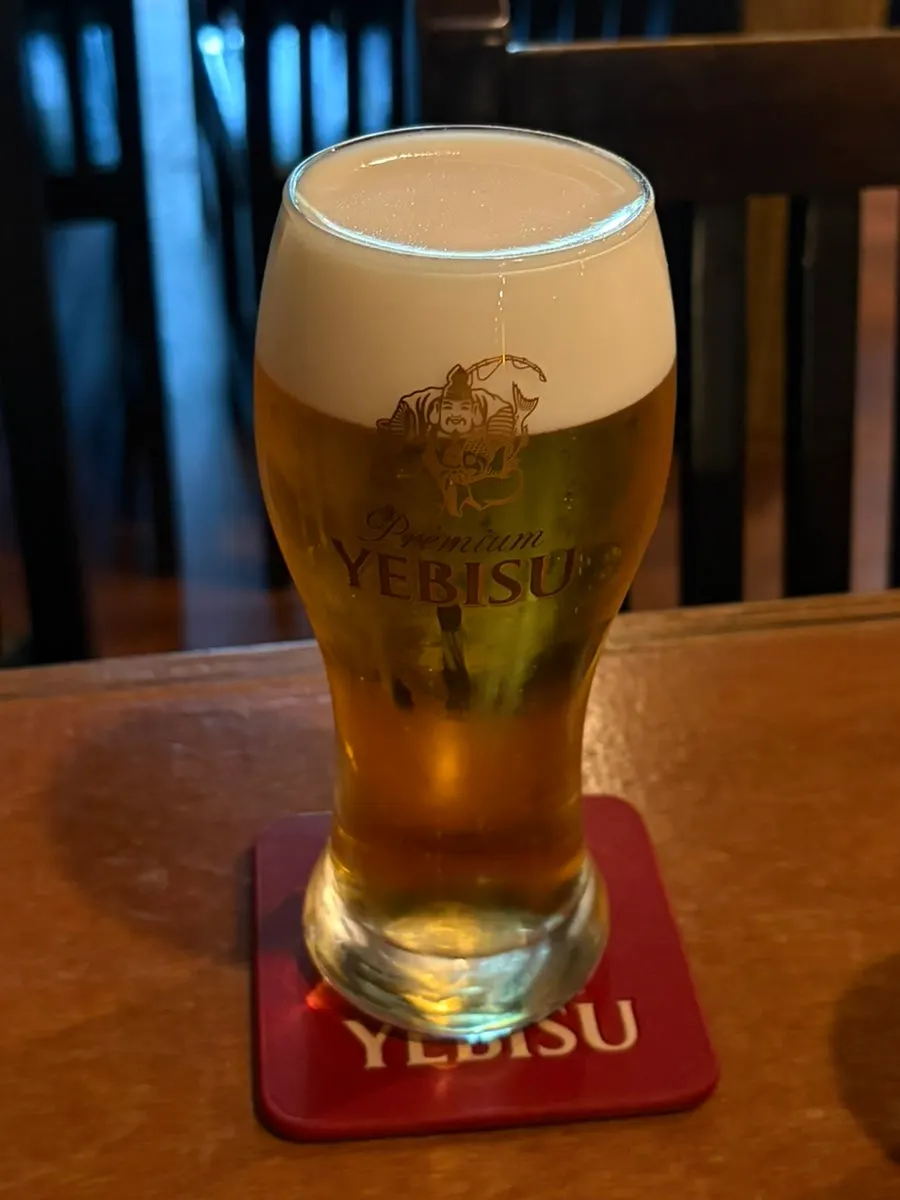 Ebisu draft beer with a coaster
