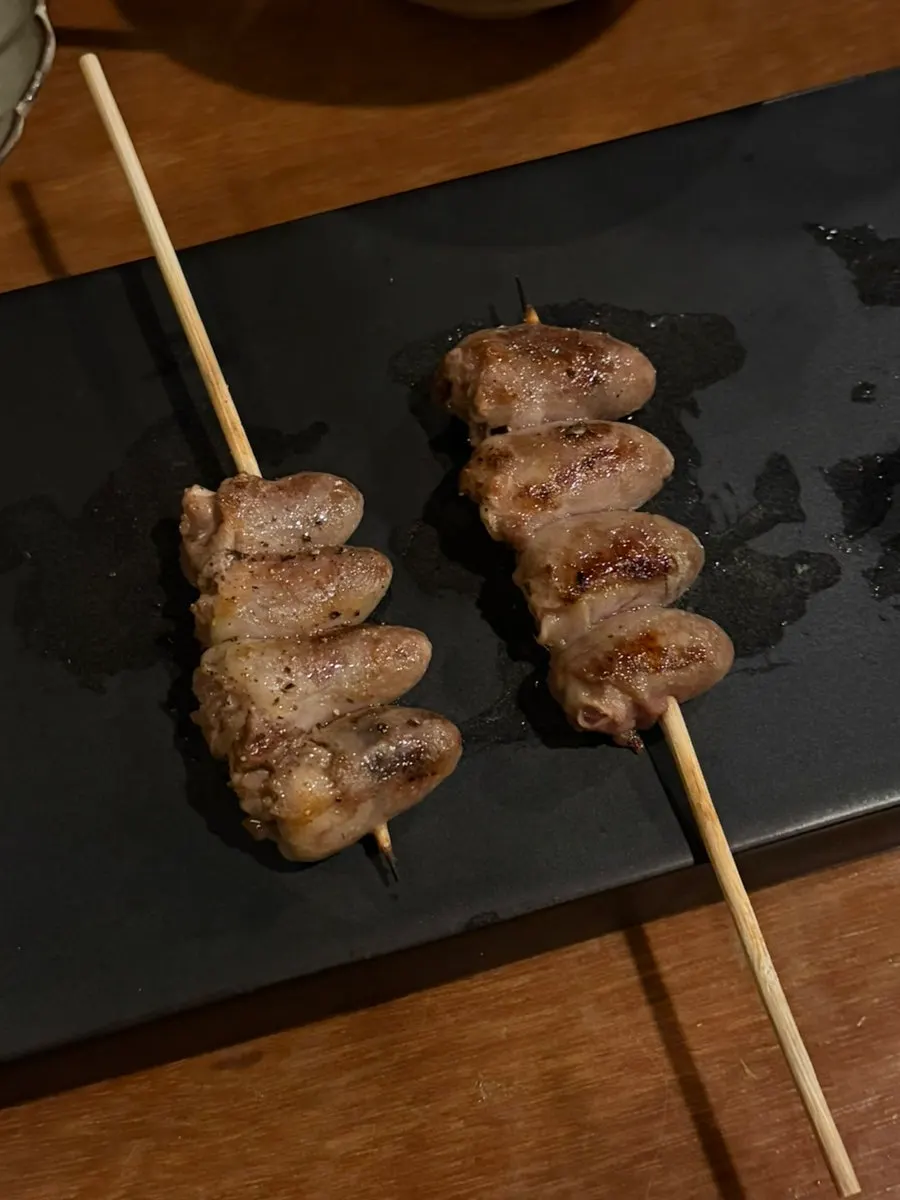 Tsukune served with egg yolk