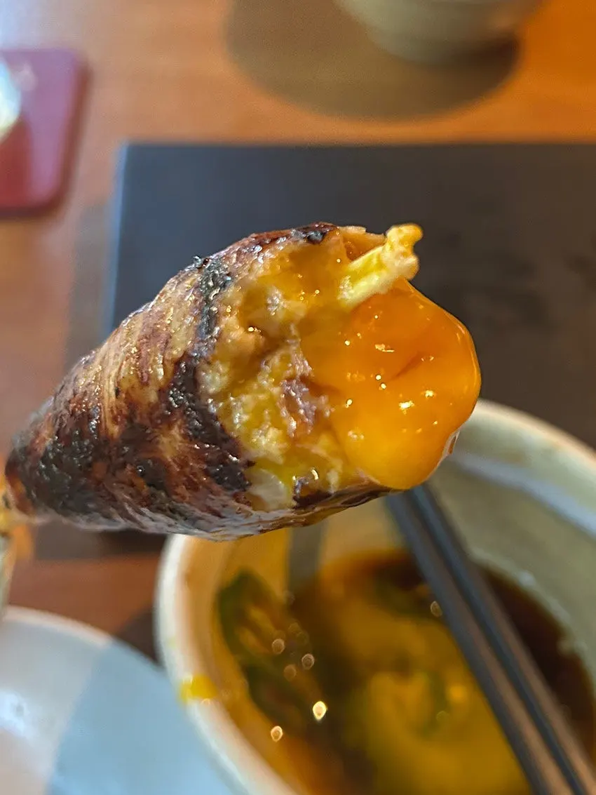 Tsukune served with egg yolk