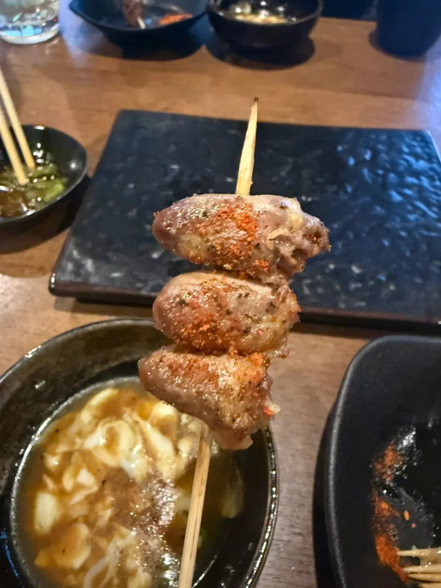 Shichimi spice served alongside the skewers