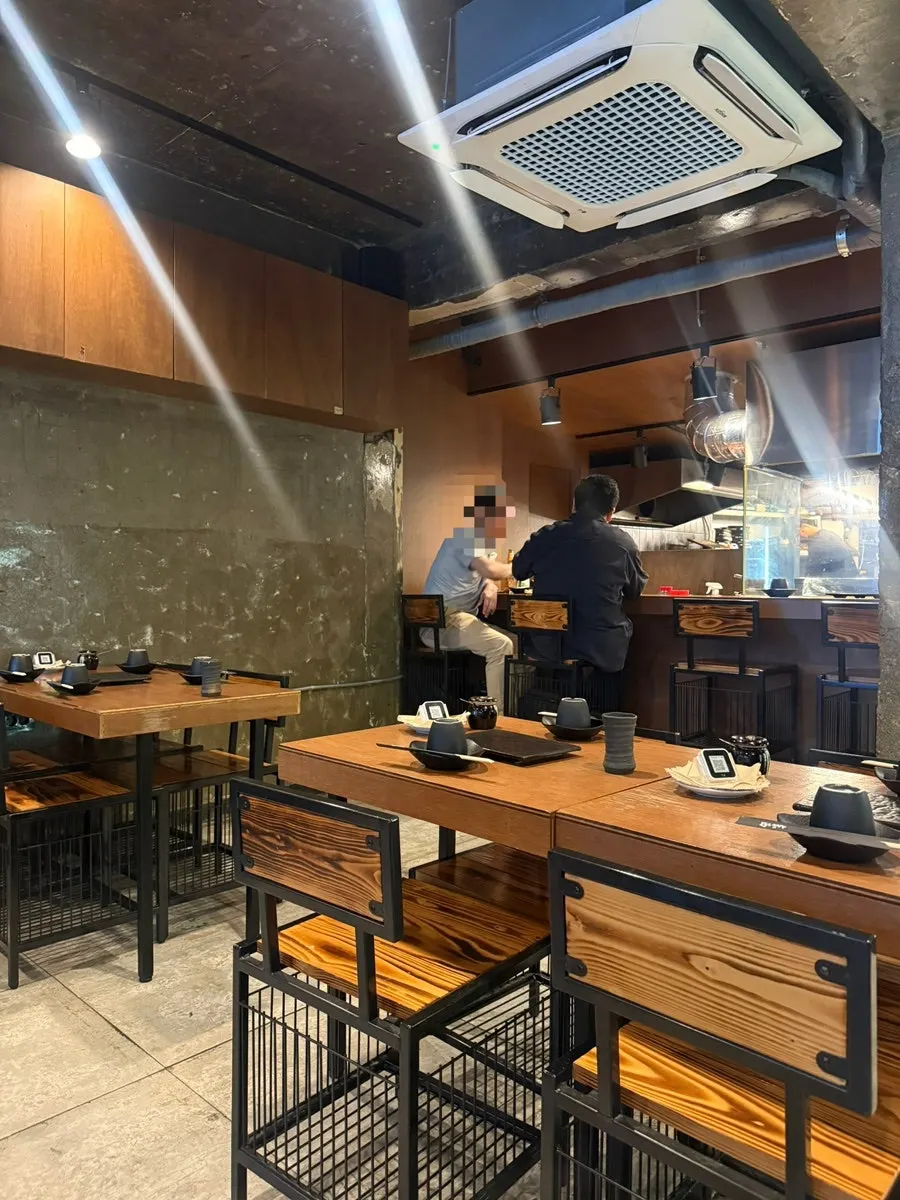 View of the Mapo street through the floor-to-ceiling window