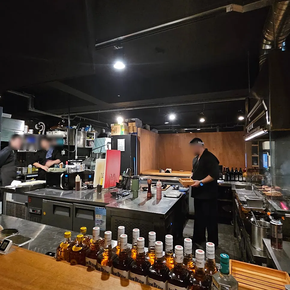 Seating and menu spread at Yakitori Shomong