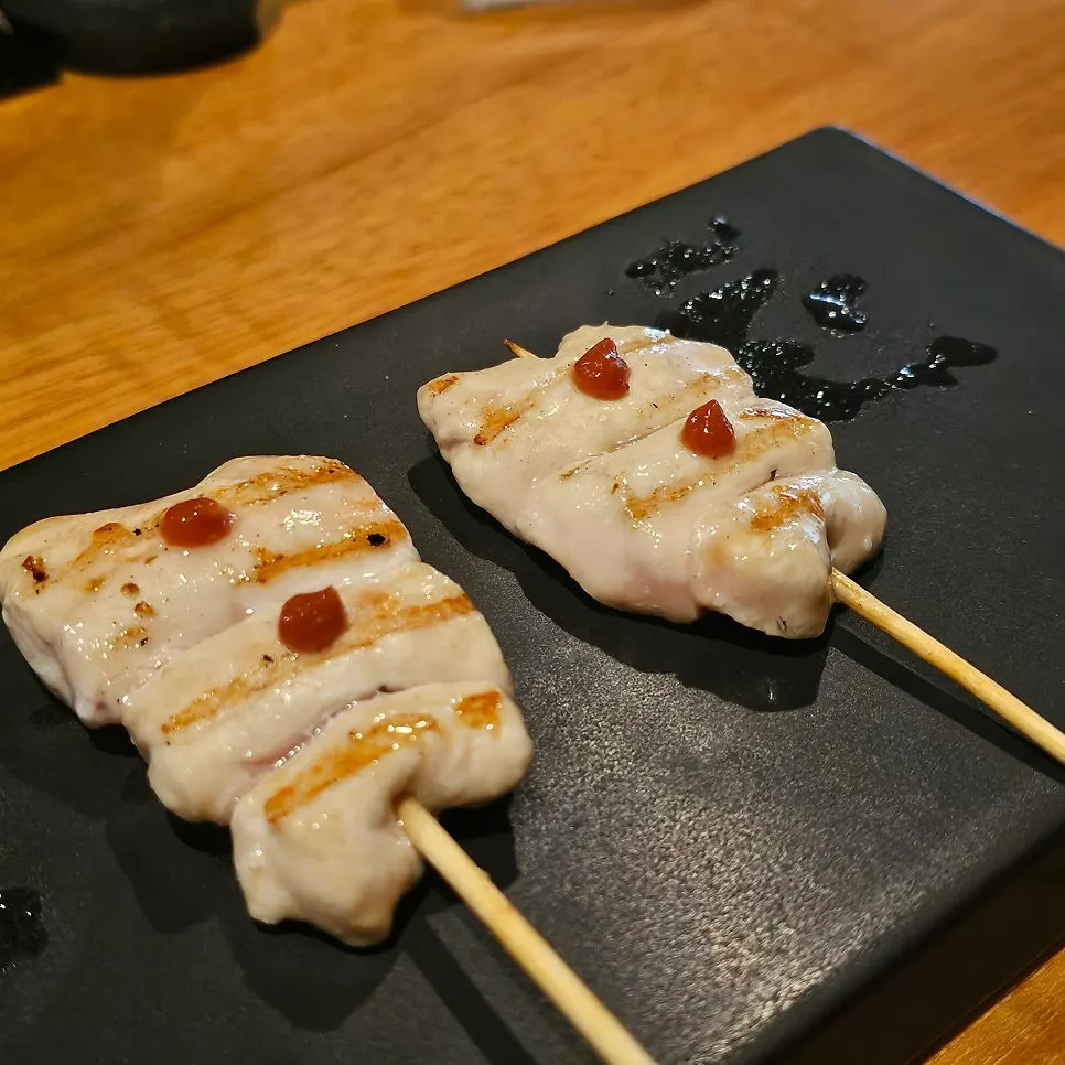 Yakitori skewers served one by one