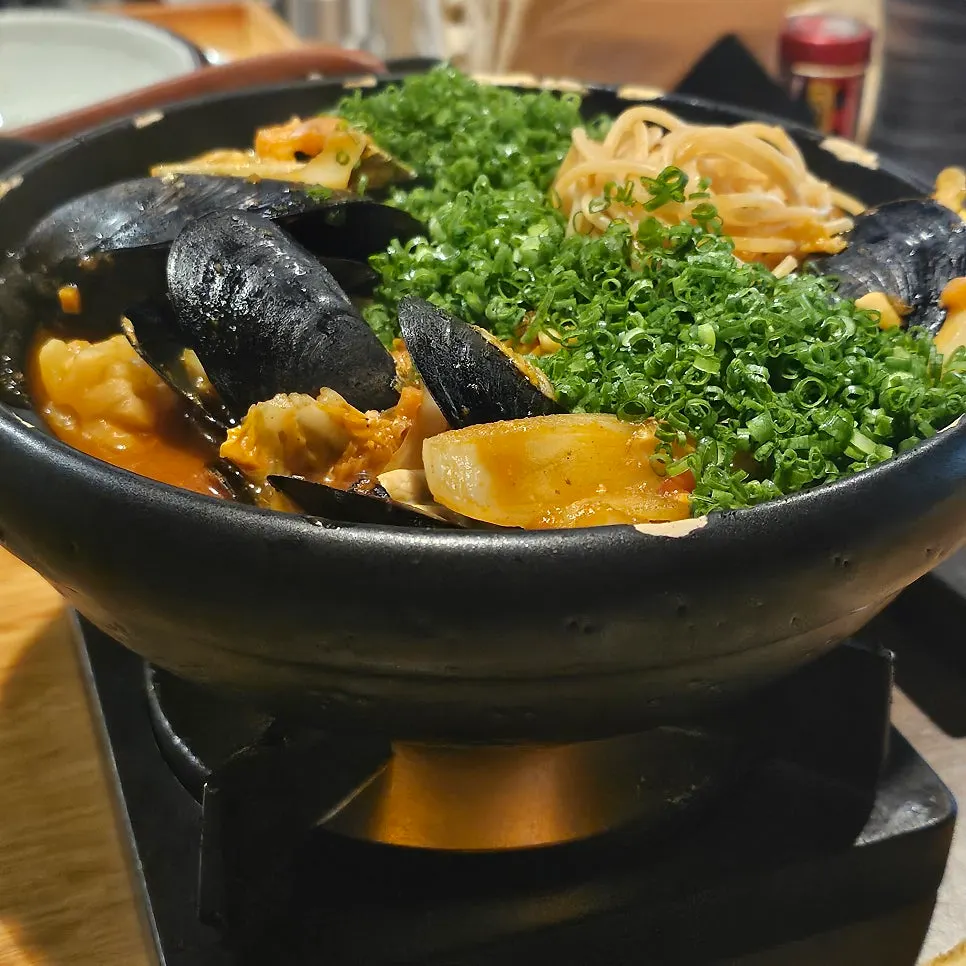 Seafood tomato nabe broth