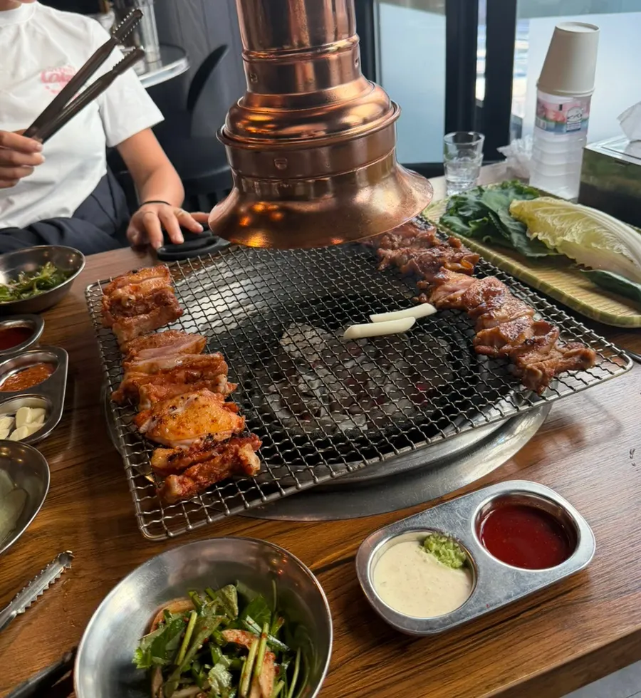 One serving each of herbal marinade and handmade soy sauce charcoal dakgalbi