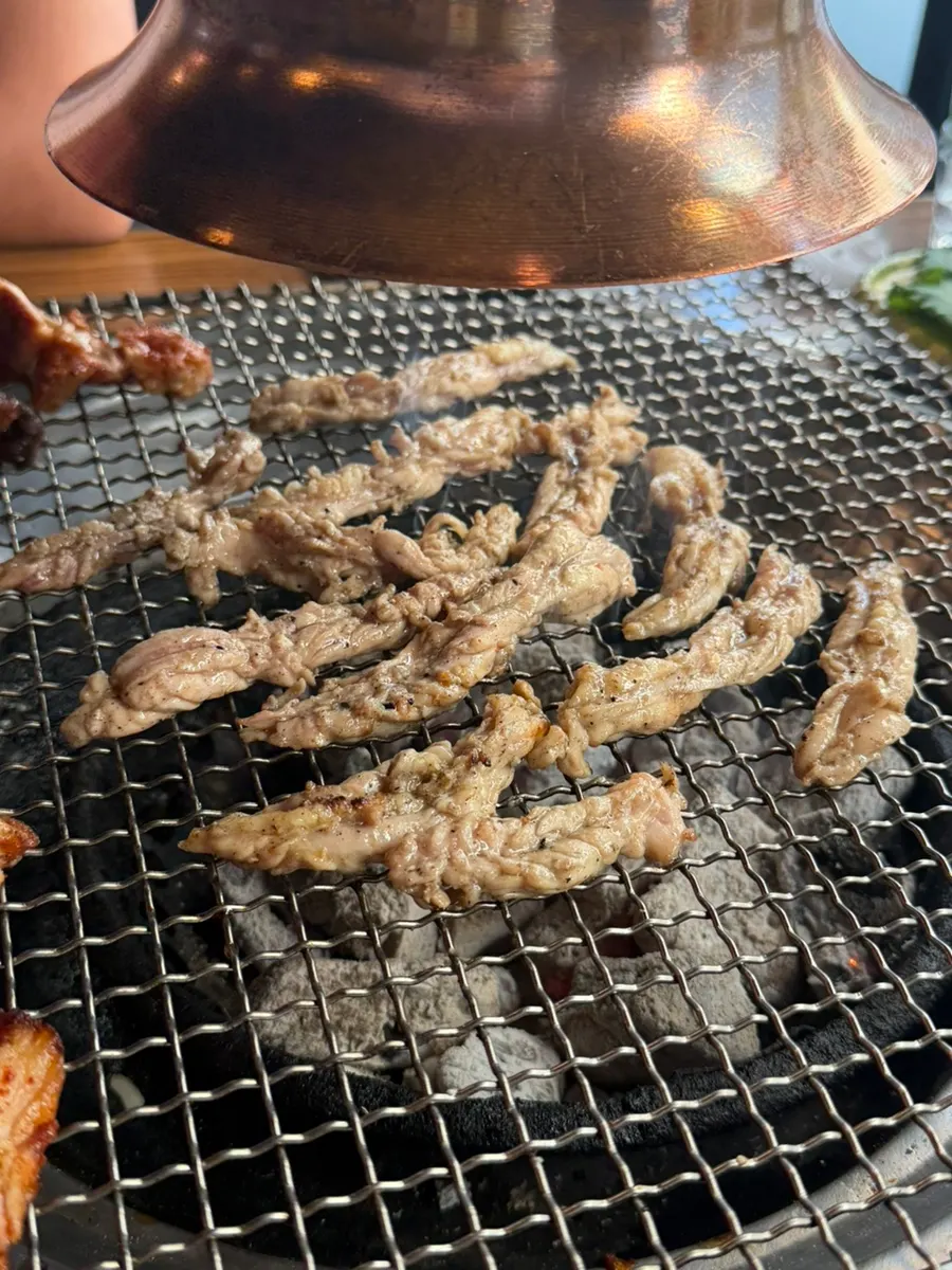 Dakgalbi dipped in wasabi mayo sauce