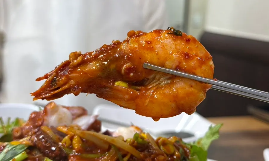 Plump white-leg shrimp in the seafood stew